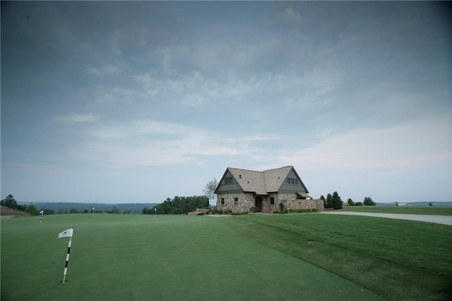 exterior space with a front yard