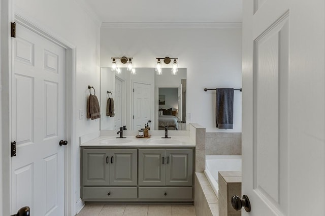 bathroom featuring crown molding, a sink, and double vanity