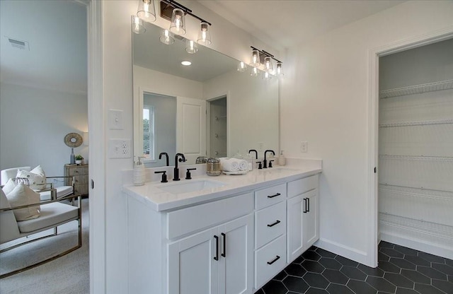 113 Priestwood Ln, Acworth, GA 30102 - bathroom with a shower stall, tile patterned flooring, a sink, and visible vents