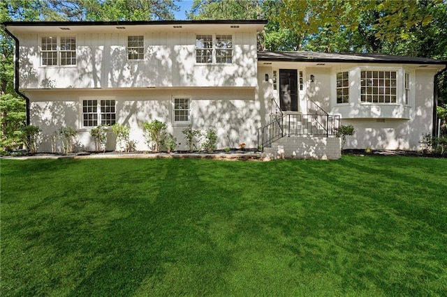 4745 Elam Forest Dr, Stone Mountain, GA 30083 - tri-level home featuring a front yard