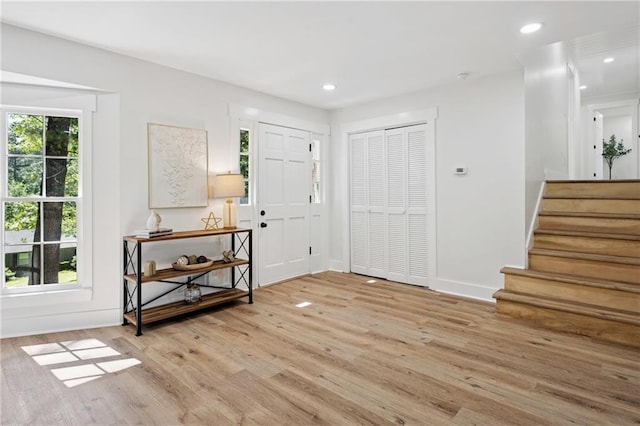4745 Elam Forest Dr, Stone Mountain, GA 30083 - entrance foyer with wood finished floors, stairway, baseboards, and recessed lighting