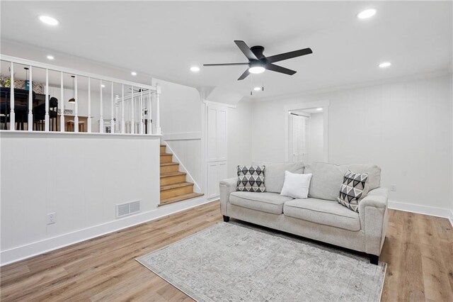 4745 Elam Forest Dr, Stone Mountain, GA 30083 - living area with a ceiling fan, wood finished floors, stairway, baseboards, and recessed lighting