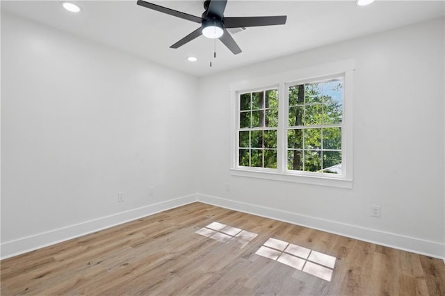 4745 Elam Forest Dr, Stone Mountain, GA 30083 - spare room featuring baseboards, recessed lighting, wood finished floors, and a ceiling fan