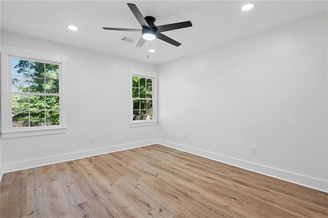 4745 Elam Forest Dr, Stone Mountain, GA 30083 - unfurnished room with baseboards, light wood-style flooring, recessed lighting, and a ceiling fan