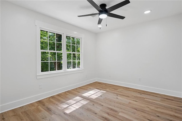 4745 Elam Forest Dr, Stone Mountain, GA 30083 - unfurnished room featuring baseboards, wood finished floors, a ceiling fan, and recessed lighting