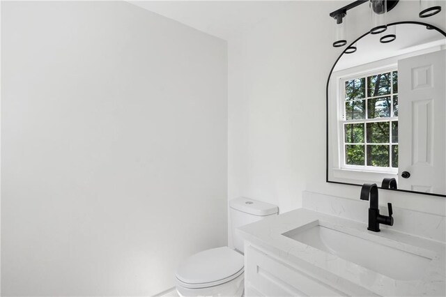 4745 Elam Forest Dr, Stone Mountain, GA 30083 - half bath featuring toilet and vanity