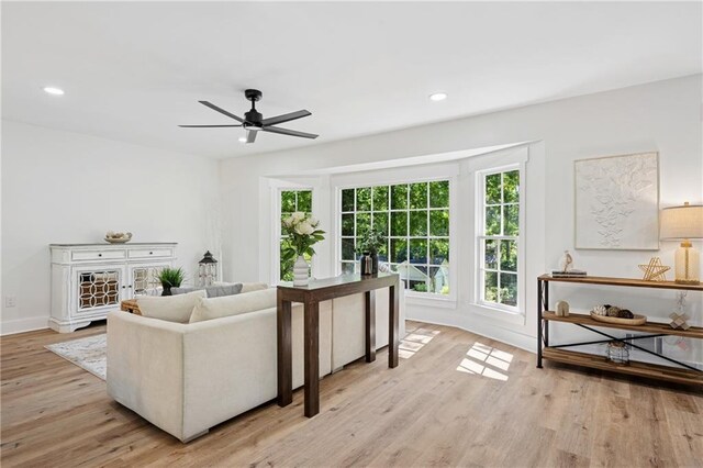 4745 Elam Forest Dr, Stone Mountain, GA 30083 - living room with wood finished floors, a ceiling fan, recessed lighting, and baseboards