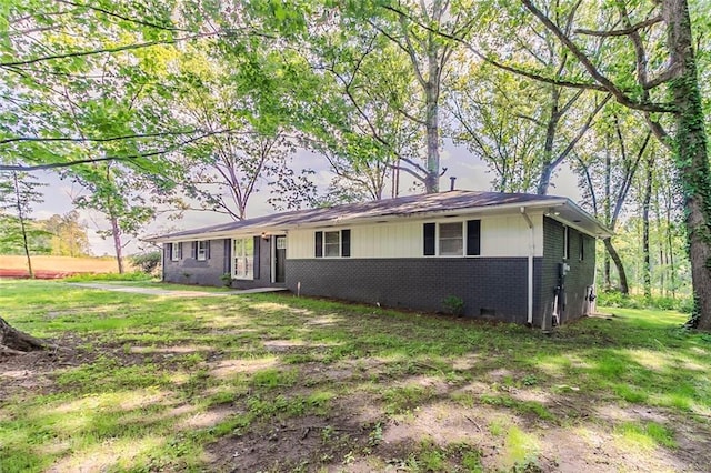 545 Fayetteville Rd, Fairburn, GA 30213 - ranch-style house featuring brick siding and a front yard