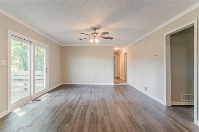 545 Fayetteville Rd, Fairburn, GA 30213 - empty room featuring dark wood finished floors, ceiling fan, ornamental molding, a textured ceiling, and baseboards