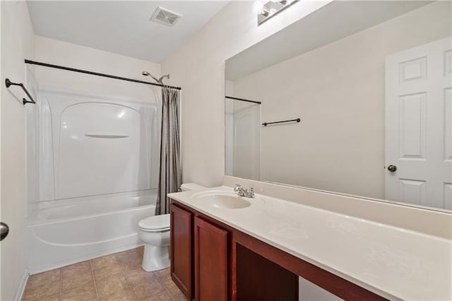 full bathroom featuring vanity, tile patterned flooring, shower / bathtub combination with curtain, and toilet