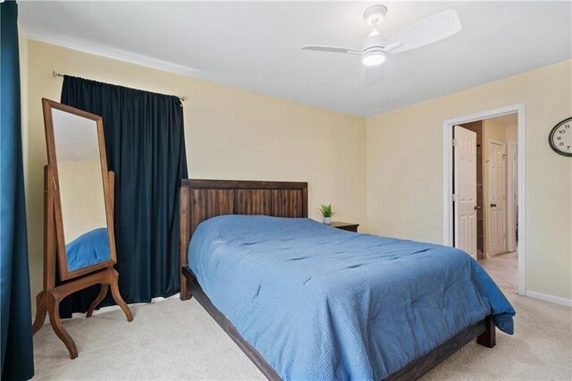 bedroom with ceiling fan and carpet floors