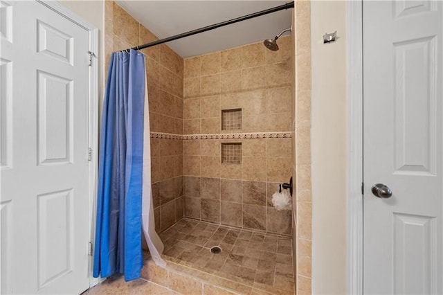 bathroom with curtained shower