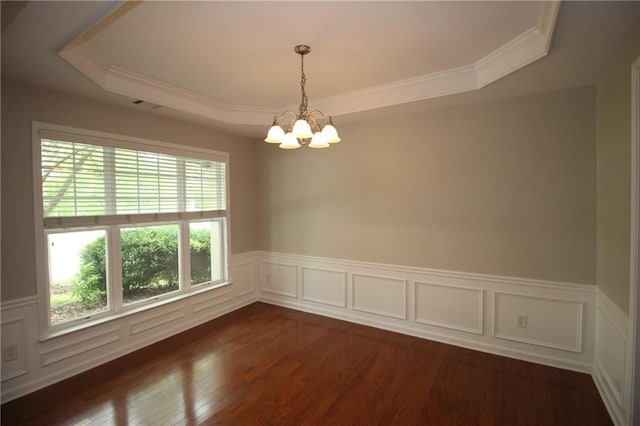 942 Idlewood Dr, Canton, GA 30115 - unfurnished room featuring a chandelier, ornamental molding, a wainscoted wall, dark wood-style floors, and a raised ceiling