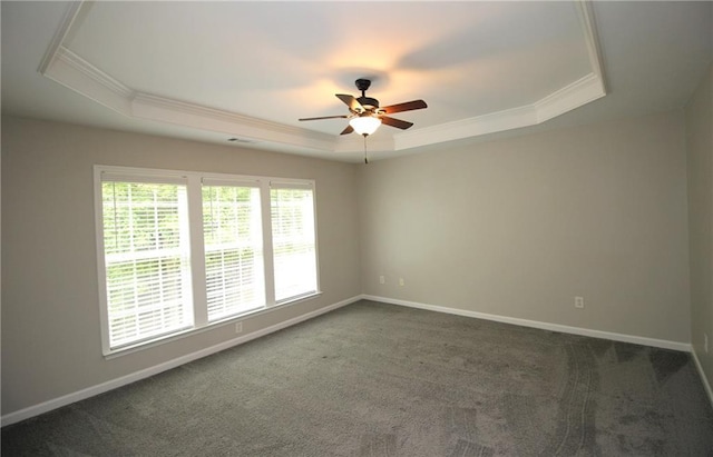 942 Idlewood Dr, Canton, GA 30115 - unfurnished room with a raised ceiling, ornamental molding, a ceiling fan, and dark colored carpet