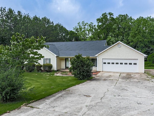 10307 E Cherokee Dr, Canton, GA 30115 - single story home with an attached garage, concrete driveway, and a front yard