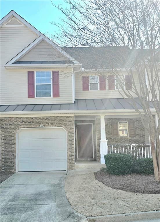 view of front of home featuring a garage