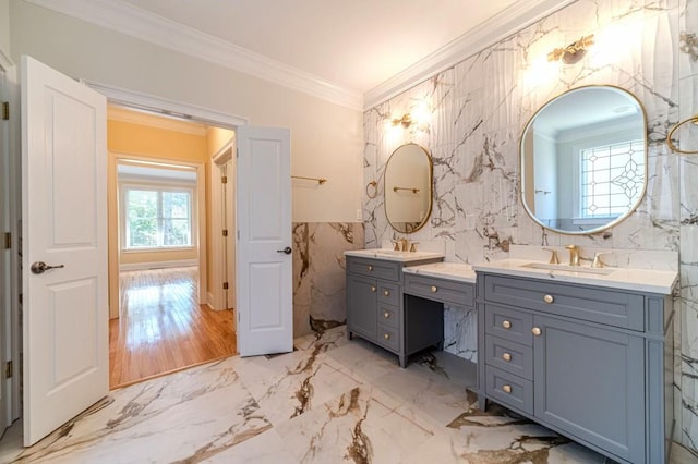 980 Windsor Place Cir, Grayson, GA 30017 - bathroom with tile walls, vanity, crown molding, wainscoting, and marble finish flooring