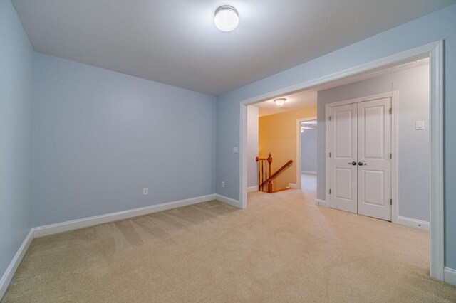 980 Windsor Place Cir, Grayson, GA 30017 - unfurnished room featuring light colored carpet and baseboards