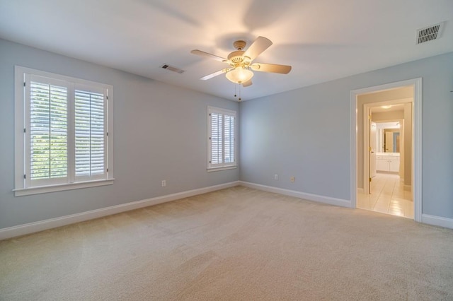 980 Windsor Place Cir, Grayson, GA 30017 - unfurnished room featuring light carpet, ceiling fan, and baseboards