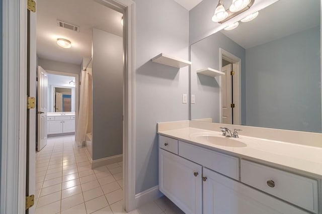 980 Windsor Place Cir, Grayson, GA 30017 - full bathroom featuring vanity, tile patterned flooring, and baseboards