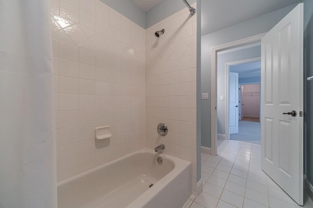 980 Windsor Place Cir, Grayson, GA 30017 - bathroom with tile patterned floors, bathtub / shower combination, and baseboards