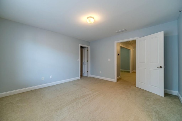980 Windsor Place Cir, Grayson, GA 30017 - unfurnished bedroom featuring light carpet and baseboards