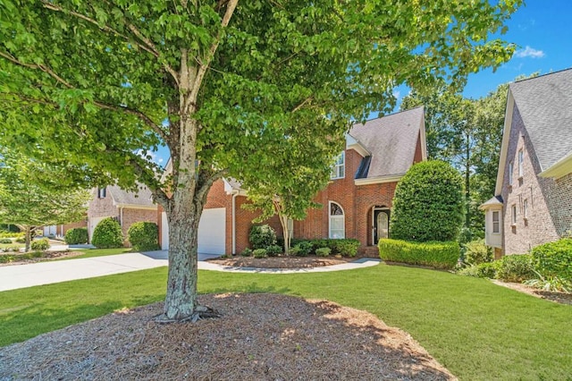 980 Windsor Place Cir, Grayson, GA 30017 - view of front of property with brick siding, driveway, a front yard, and a garage