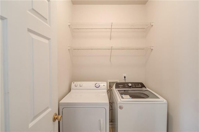 laundry area featuring washer and clothes dryer