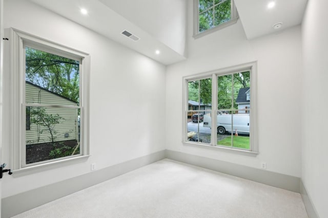 2760 Fraser St SE, Smyrna, GA 30080 - carpeted spare room with plenty of natural light, recessed lighting, and a smoke detector