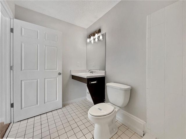 256 Prometheous Way, Rockmart, GA 30153 - bathroom with tile patterned floors, vanity, and a textured ceiling