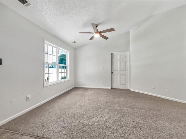 256 Prometheous Way, Rockmart, GA 30153 - spare room featuring ceiling fan, carpet floors, a textured ceiling, and lofted ceiling