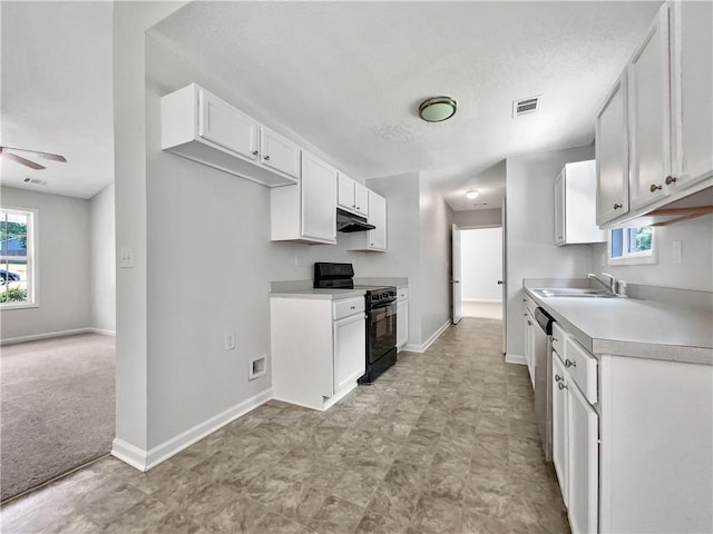 256 Prometheous Way, Rockmart, GA 30153 - kitchen with electric range, under cabinet range hood, light countertops, white cabinets, and ceiling fan
