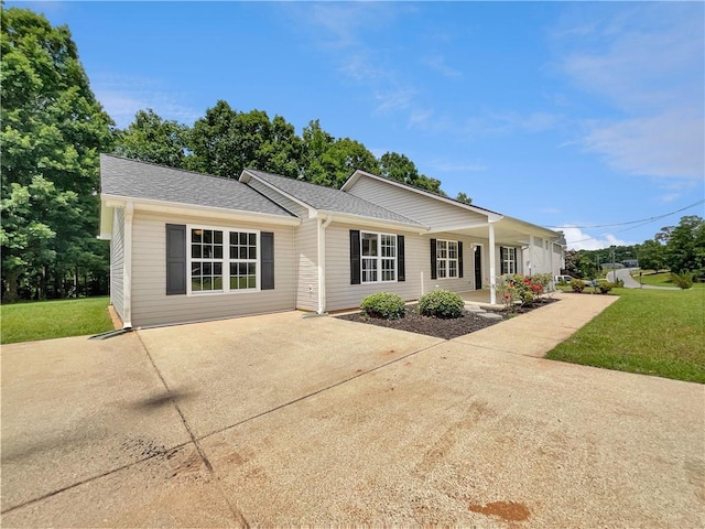 256 Prometheous Way, Rockmart, GA 30153 - view of front of home featuring a front yard, a shingled roof, and driveway