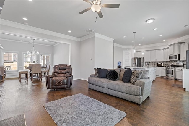 living area featuring recessed lighting, visible vents, dark wood-style floors, and crown molding