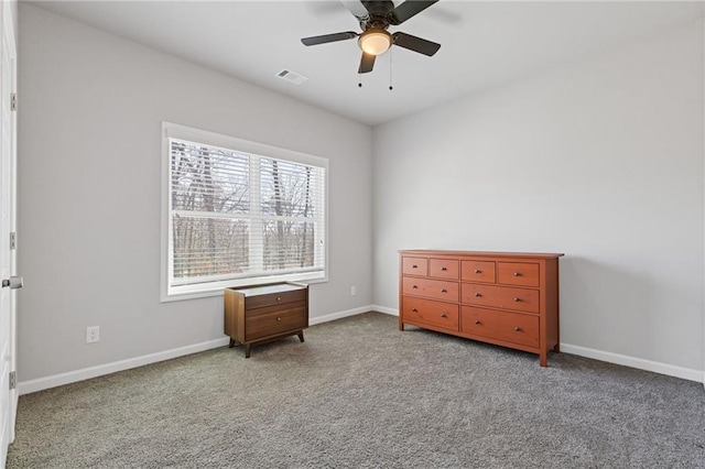 carpeted bedroom with baseboards, visible vents, and ceiling fan