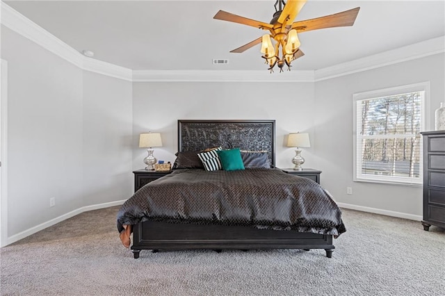 bedroom with baseboards, visible vents, carpet floors, ceiling fan, and crown molding