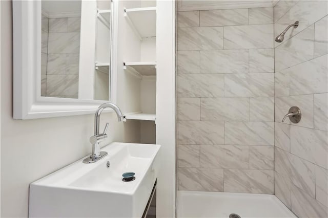 full bath featuring a shower stall and vanity