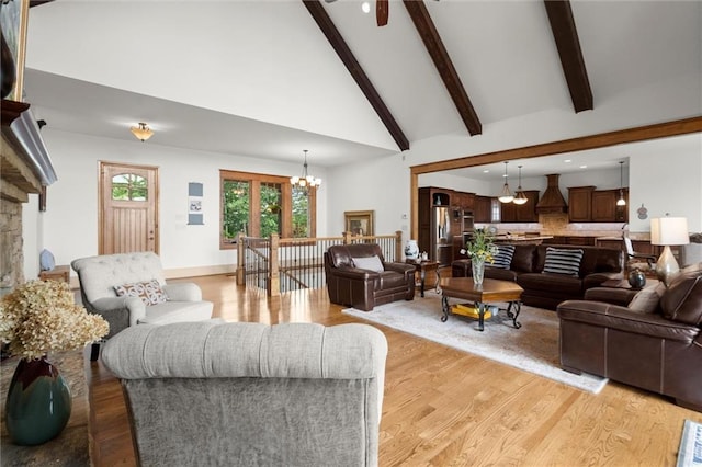 49 Waterside Dr SE, Cartersville, GA 30121 - living area with a chandelier, light wood-style floors, beamed ceiling, high vaulted ceiling, and recessed lighting