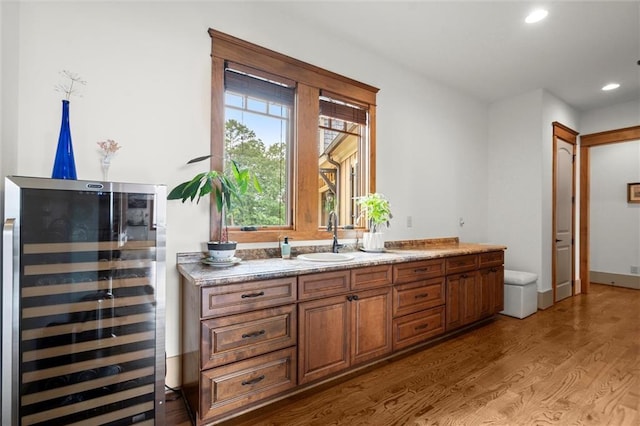 49 Waterside Dr SE, Cartersville, GA 30121 - bar featuring wine cooler, light wood-style flooring, and recessed lighting