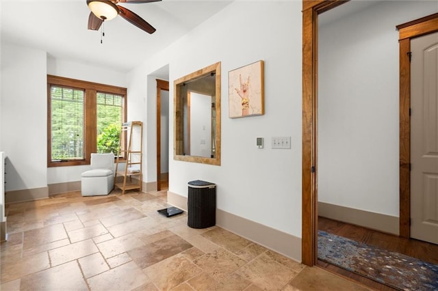 49 Waterside Dr SE, Cartersville, GA 30121 - spare room featuring a ceiling fan and stone tile floors