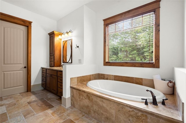 49 Waterside Dr SE, Cartersville, GA 30121 - full bathroom featuring vanity, a bath, and stone tile flooring
