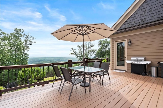 49 Waterside Dr SE, Cartersville, GA 30121 - wooden deck with a grill and outdoor dining area