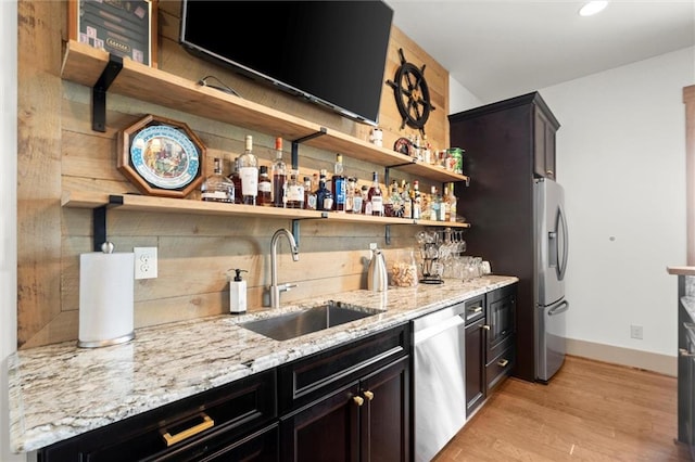49 Waterside Dr SE, Cartersville, GA 30121 - indoor wet bar with stainless steel appliances and light wood-style flooring