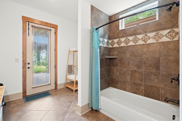 49 Waterside Dr SE, Cartersville, GA 30121 - bathroom featuring shower / bath combo with shower curtain, tile patterned floors, and a skylight