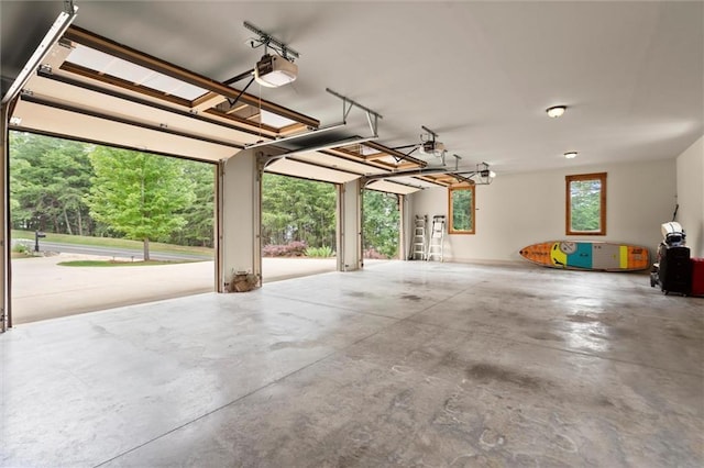 49 Waterside Dr SE, Cartersville, GA 30121 - garage featuring a garage door opener