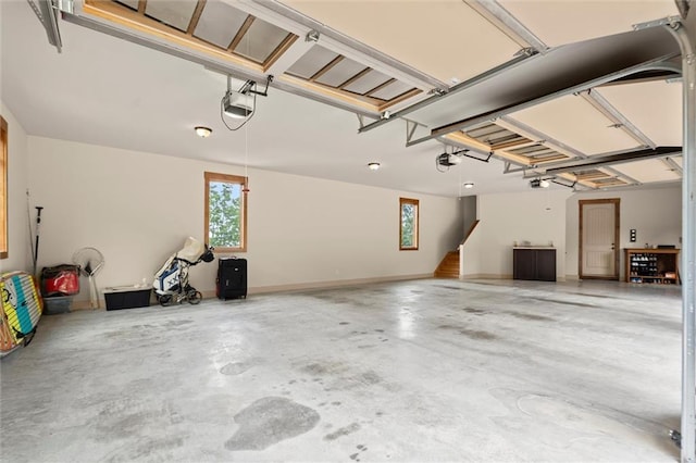 49 Waterside Dr SE, Cartersville, GA 30121 - garage featuring a garage door opener
