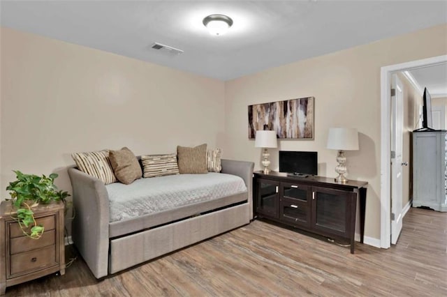 living room with light hardwood / wood-style flooring