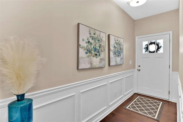 foyer with dark hardwood / wood-style floors