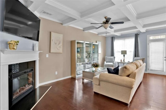 living room with coffered ceiling, dark wood-type flooring, and beamed ceiling