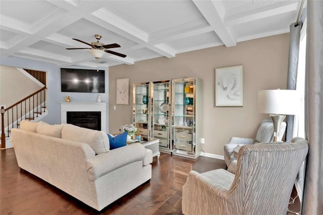 living room featuring coffered ceiling, ceiling fan, beam ceiling, and dark hardwood / wood-style flooring